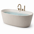 Baignoire îlot ovale en résine composite blanche avec mitigeur en laiton